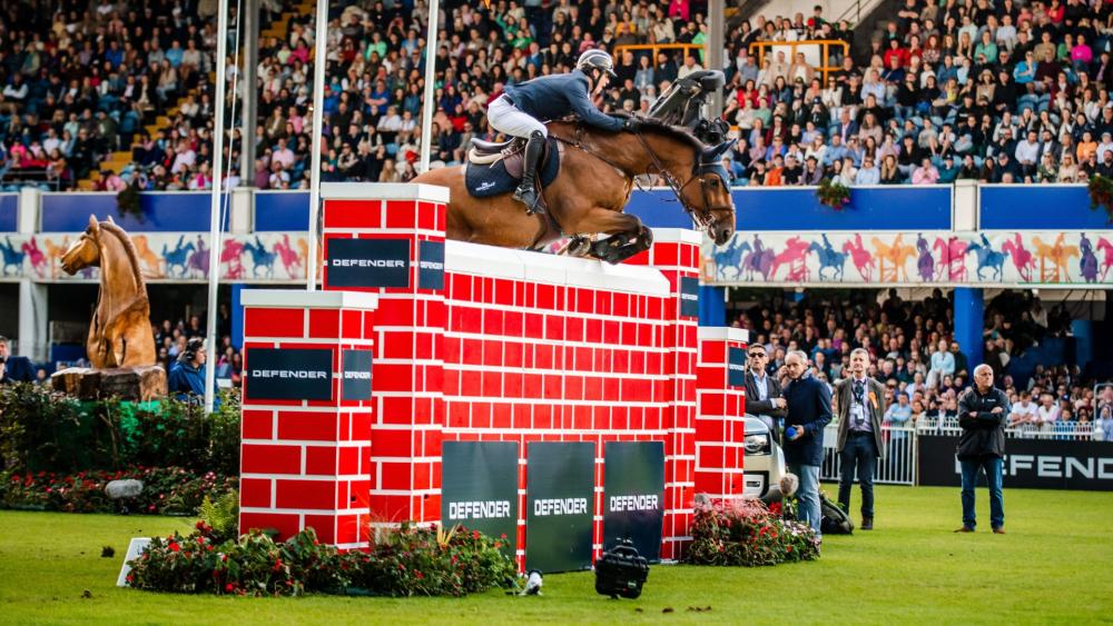 Ireland&rsquo;s Mikey Pender and Hearton du Bois Halleux in action during the Defender Puissance at the RDS Dublin Horse Show, 2022 (Photo: Tori O&rsquo;Connor, Equine Photographer)